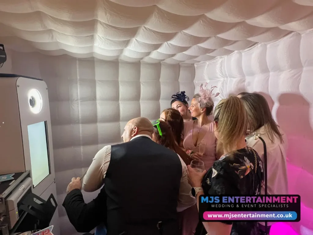 Guest using our Selfie Cube Photo Booth Hire (4)